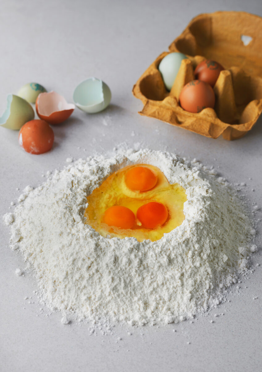 Flour-broken-eggs-paste-making-penne-ravioli